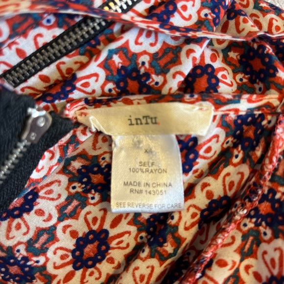 Intu  cold shoulder dress with rust navy blue black and white pattern.  Size XS - Picture 2 of 5